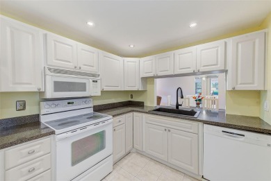 Rarely available, first floor, 3 bedroom, 2 bath corner unit on Largo Golf Course in Florida - for sale on GolfHomes.com, golf home, golf lot