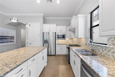 This modern and immaculate two-bedroom plus den residence offers on Calusa Pines Golf Club in Florida - for sale on GolfHomes.com, golf home, golf lot