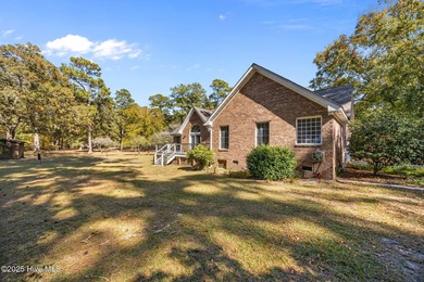 With many recent updates and curb appeal galore, this attractive on Washington Yacht and Country Club in North Carolina - for sale on GolfHomes.com, golf home, golf lot
