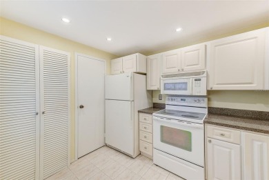 Rarely available, first floor, 3 bedroom, 2 bath corner unit on Largo Golf Course in Florida - for sale on GolfHomes.com, golf home, golf lot