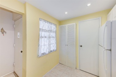 Rarely available, first floor, 3 bedroom, 2 bath corner unit on Largo Golf Course in Florida - for sale on GolfHomes.com, golf home, golf lot