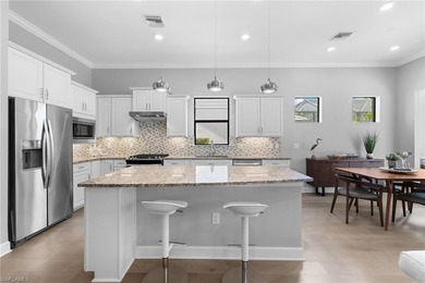 This modern and immaculate two-bedroom plus den residence offers on Calusa Pines Golf Club in Florida - for sale on GolfHomes.com, golf home, golf lot