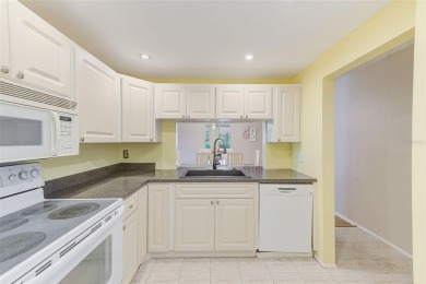 Rarely available, first floor, 3 bedroom, 2 bath corner unit on Largo Golf Course in Florida - for sale on GolfHomes.com, golf home, golf lot