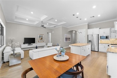 This modern and immaculate two-bedroom plus den residence offers on Calusa Pines Golf Club in Florida - for sale on GolfHomes.com, golf home, golf lot