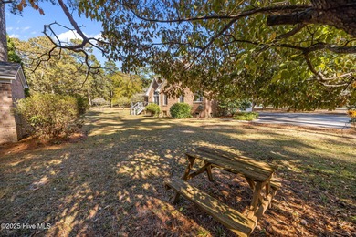 With many recent updates and curb appeal galore, this attractive on Washington Yacht and Country Club in North Carolina - for sale on GolfHomes.com, golf home, golf lot