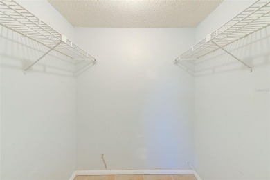 Rarely available, first floor, 3 bedroom, 2 bath corner unit on Largo Golf Course in Florida - for sale on GolfHomes.com, golf home, golf lot