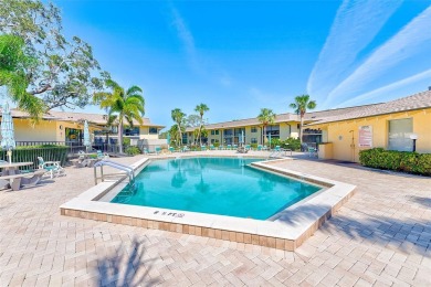 Rarely available, first floor, 3 bedroom, 2 bath corner unit on Largo Golf Course in Florida - for sale on GolfHomes.com, golf home, golf lot