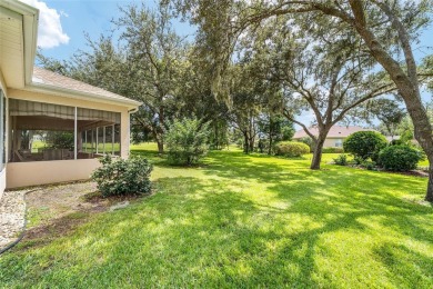 Located on a quiet cul-de-sac with golf course views, this on Eagle Ridge At Spruce Creek Country Club in Florida - for sale on GolfHomes.com, golf home, golf lot