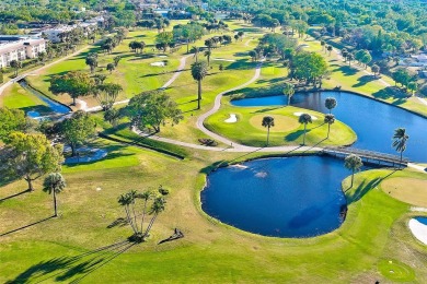 Rarely available, first floor, 3 bedroom, 2 bath corner unit on Largo Golf Course in Florida - for sale on GolfHomes.com, golf home, golf lot