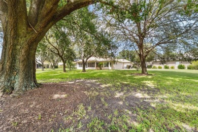 Located on a quiet cul-de-sac with golf course views, this on Eagle Ridge At Spruce Creek Country Club in Florida - for sale on GolfHomes.com, golf home, golf lot
