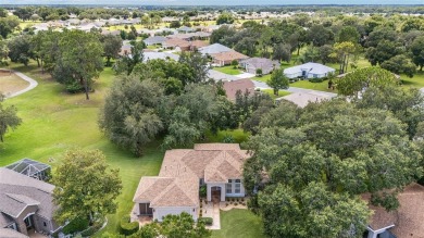Located on a quiet cul-de-sac with golf course views, this on Eagle Ridge At Spruce Creek Country Club in Florida - for sale on GolfHomes.com, golf home, golf lot