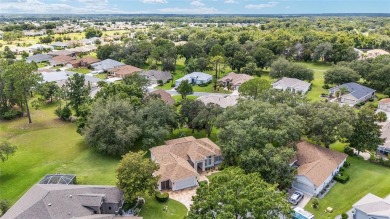 Located on a quiet cul-de-sac with golf course views, this on Eagle Ridge At Spruce Creek Country Club in Florida - for sale on GolfHomes.com, golf home, golf lot