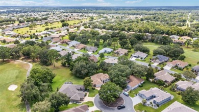 Located on a quiet cul-de-sac with golf course views, this on Eagle Ridge At Spruce Creek Country Club in Florida - for sale on GolfHomes.com, golf home, golf lot