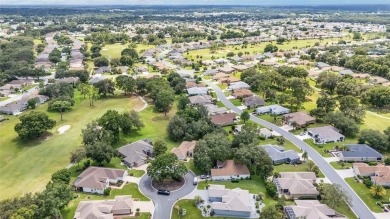 Located on a quiet cul-de-sac with golf course views, this on Eagle Ridge At Spruce Creek Country Club in Florida - for sale on GolfHomes.com, golf home, golf lot
