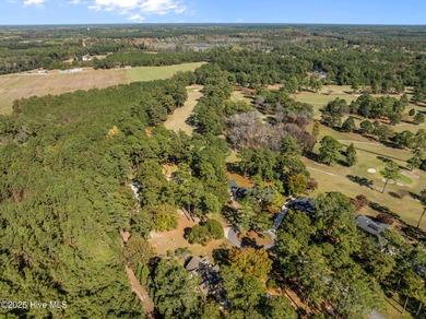 With many recent updates and curb appeal galore, this attractive on Washington Yacht and Country Club in North Carolina - for sale on GolfHomes.com, golf home, golf lot