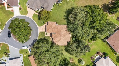 Located on a quiet cul-de-sac with golf course views, this on Eagle Ridge At Spruce Creek Country Club in Florida - for sale on GolfHomes.com, golf home, golf lot