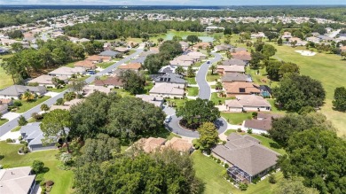 Located on a quiet cul-de-sac with golf course views, this on Eagle Ridge At Spruce Creek Country Club in Florida - for sale on GolfHomes.com, golf home, golf lot