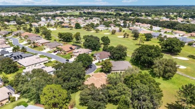 Located on a quiet cul-de-sac with golf course views, this on Eagle Ridge At Spruce Creek Country Club in Florida - for sale on GolfHomes.com, golf home, golf lot