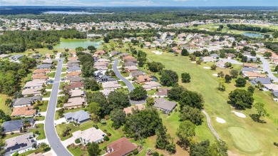 Located on a quiet cul-de-sac with golf course views, this on Eagle Ridge At Spruce Creek Country Club in Florida - for sale on GolfHomes.com, golf home, golf lot