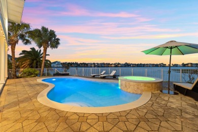 Turnkey Lakefront Home with Gulf Views | 6 Bed | 4.5 Bath | on Emerald Bay Golf Club in Florida - for sale on GolfHomes.com, golf home, golf lot