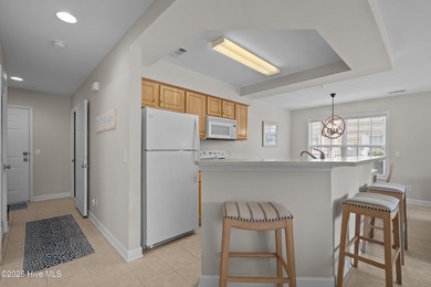 Step into coastal comfort with this spacious, 2-bedroom, 2-bath on Brunswick Plantation and Golf Resorts in North Carolina - for sale on GolfHomes.com, golf home, golf lot