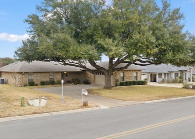 This newly listed home in coveted Meadowlakes offers handsome on Hidden Falls Golf Club in Texas - for sale on GolfHomes.com, golf home, golf lot