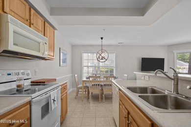 Step into coastal comfort with this spacious, 2-bedroom, 2-bath on Brunswick Plantation and Golf Resorts in North Carolina - for sale on GolfHomes.com, golf home, golf lot