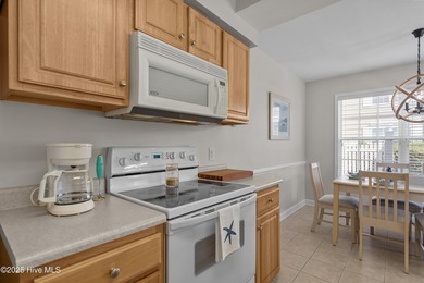 Step into coastal comfort with this spacious, 2-bedroom, 2-bath on Brunswick Plantation and Golf Resorts in North Carolina - for sale on GolfHomes.com, golf home, golf lot