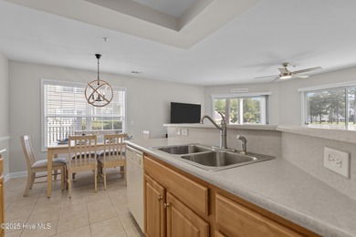 Step into coastal comfort with this spacious, 2-bedroom, 2-bath on Brunswick Plantation and Golf Resorts in North Carolina - for sale on GolfHomes.com, golf home, golf lot