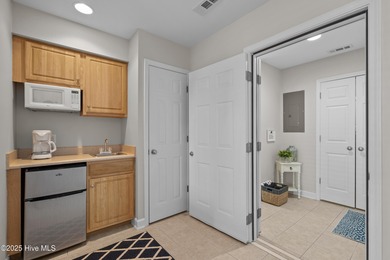 Step into coastal comfort with this spacious, 2-bedroom, 2-bath on Brunswick Plantation and Golf Resorts in North Carolina - for sale on GolfHomes.com, golf home, golf lot