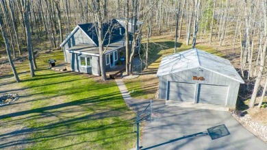 Welcome to your Northern Michigan retreat--just minutes from on Little Traverse Bay Golf Club and Restaurant in Michigan - for sale on GolfHomes.com, golf home, golf lot