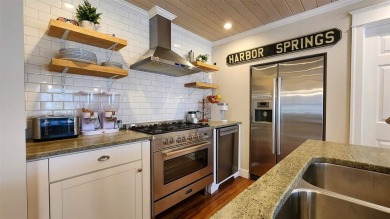 Welcome to your Northern Michigan retreat--just minutes from on Little Traverse Bay Golf Club and Restaurant in Michigan - for sale on GolfHomes.com, golf home, golf lot