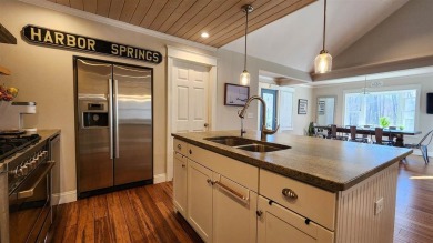 Welcome to your Northern Michigan retreat--just minutes from on Little Traverse Bay Golf Club and Restaurant in Michigan - for sale on GolfHomes.com, golf home, golf lot