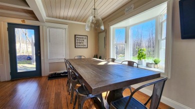 Welcome to your Northern Michigan retreat--just minutes from on Little Traverse Bay Golf Club and Restaurant in Michigan - for sale on GolfHomes.com, golf home, golf lot