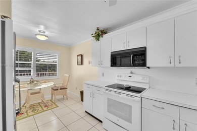 A TOP-RATED 55+ COMMUNITY! Beautifully maintained 2/2 condo in on Sunrise Lakes Phase IV Golf Course in Florida - for sale on GolfHomes.com, golf home, golf lot