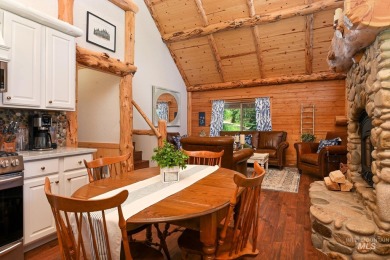 Introducing a one-of-a-kind hand-hewn log cabin nestled in the on Terrace Lakes Golf Resort in Idaho - for sale on GolfHomes.com, golf home, golf lot