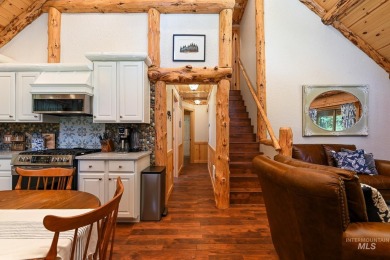 Introducing a one-of-a-kind hand-hewn log cabin nestled in the on Terrace Lakes Golf Resort in Idaho - for sale on GolfHomes.com, golf home, golf lot