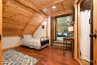 Introducing a one-of-a-kind hand-hewn log cabin nestled in the on Terrace Lakes Golf Resort in Idaho - for sale on GolfHomes.com, golf home, golf lot