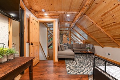 Introducing a one-of-a-kind hand-hewn log cabin nestled in the on Terrace Lakes Golf Resort in Idaho - for sale on GolfHomes.com, golf home, golf lot