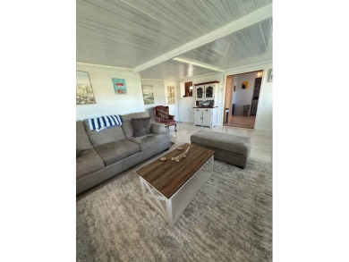 Imagine every day having coffee or lunch on your private deck on Hamptons Golf Club in Florida - for sale on GolfHomes.com, golf home, golf lot