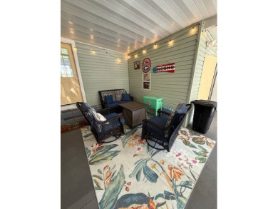 Imagine every day having coffee or lunch on your private deck on Hamptons Golf Club in Florida - for sale on GolfHomes.com, golf home, golf lot