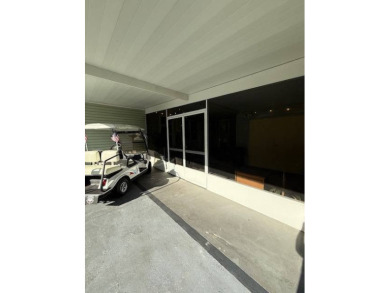 Imagine every day having coffee or lunch on your private deck on Hamptons Golf Club in Florida - for sale on GolfHomes.com, golf home, golf lot