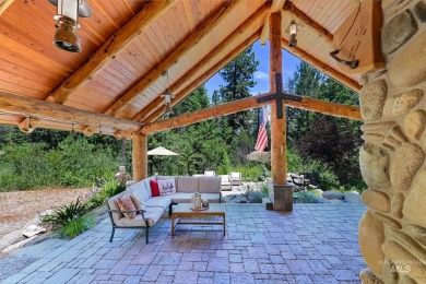 Introducing a one-of-a-kind hand-hewn log cabin nestled in the on Terrace Lakes Golf Resort in Idaho - for sale on GolfHomes.com, golf home, golf lot