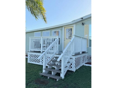 Imagine every day having coffee or lunch on your private deck on Hamptons Golf Club in Florida - for sale on GolfHomes.com, golf home, golf lot