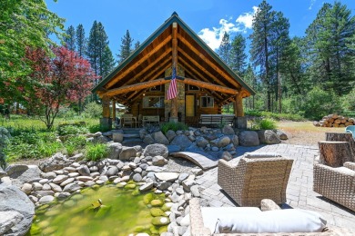 Introducing a one-of-a-kind hand-hewn log cabin nestled in the on Terrace Lakes Golf Resort in Idaho - for sale on GolfHomes.com, golf home, golf lot