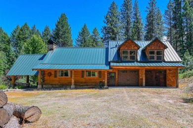 Introducing a one-of-a-kind hand-hewn log cabin nestled in the on Terrace Lakes Golf Resort in Idaho - for sale on GolfHomes.com, golf home, golf lot