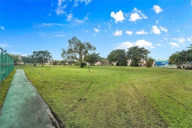 A TOP-RATED 55+ COMMUNITY! Beautifully maintained 2/2 condo in on Sunrise Lakes Phase IV Golf Course in Florida - for sale on GolfHomes.com, golf home, golf lot