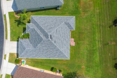 Stunning three-bedroom plus den/office, two-bath, two-car garage on Maple Leaf Golf and Country Club in Florida - for sale on GolfHomes.com, golf home, golf lot