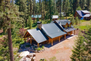 Introducing a one-of-a-kind hand-hewn log cabin nestled in the on Terrace Lakes Golf Resort in Idaho - for sale on GolfHomes.com, golf home, golf lot