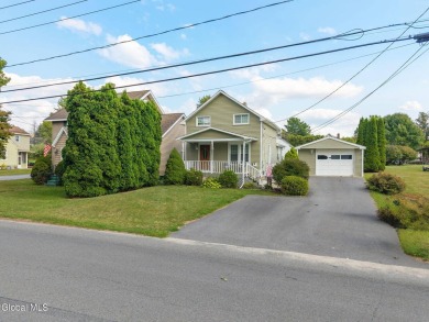 Welcome home to this charming 2-bedroom, 2-bath residence filled on Amsterdam Municipal Golf Course in New York - for sale on GolfHomes.com, golf home, golf lot
